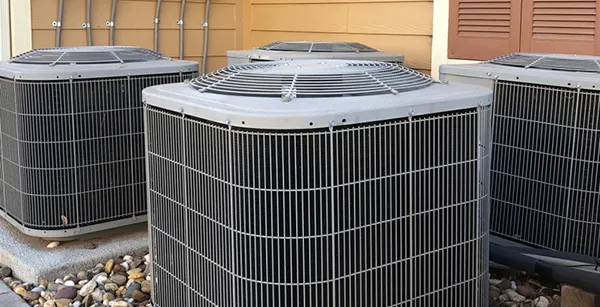 Multiple outdoor air conditioning units for residential AC repair and maintenance